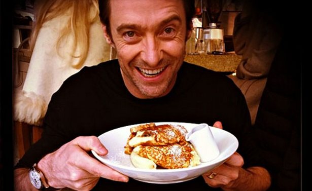 Hugh Jackman Holding a Plate of Food