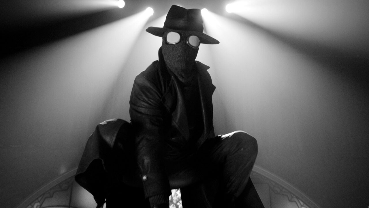 Nicolas Cage as The Spider crouched in Spider-Noir